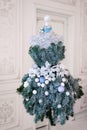 Christmas mannequin . Decorated with spruce and balloons. Tailor`s New Year`s Concept Royalty Free Stock Photo