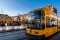 At the christmas market in Dresden with a tram in the front