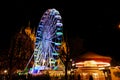 Christmas market in Erfurt with view to rolling high wheel and cathedral