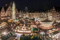 Christmas market in the city of Frankfurt am Main, Christmas lights in the evening carousel half-timbered houses and town hall Royalty Free Stock Photo