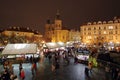 Christmas Market and lights of night in Prague, in 2016. Old Town Square with tourists. St. Nicholas Church Royalty Free Stock Photo