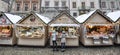 Christmas market in Lviv. Sweets trays and tourists buying presents at the Christmas market Royalty Free Stock Photo