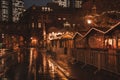 Christmas market spirit during snow night. Royalty Free Stock Photo