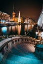 Christmas market on the Town hall square. Decorated alsterfleet stairs and beautiful Illuminated x-mas trees in front of Royalty Free Stock Photo