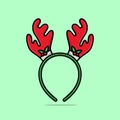 Christmas mask with brown reindeer antler isolated on light green background, Royalty Free Stock Photo