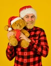 Christmas memories from childhood. Bearded man celebrate christmas. Kind hipster with teddy bear. Charity and kindness