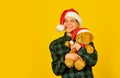 Christmas memories from childhood. Girl with teddy bear. Charity and kindness. Lovely hug. Christmas spirit. Playful