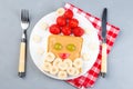 Christmas menu for kids with Santa sandwich made from toast, peanut butter, strawberry, banana, grape and apple, horizontal, top Royalty Free Stock Photo