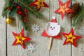 Christmas merry gift - Santa and toys star. Handmade. Project of children`s creativity, handicrafts, crafts for