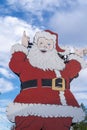 Large Santa Claus outside of the North Pole Santa`s Workshop store Royalty Free Stock Photo