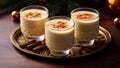 Christmas milk drink with spices, eggnog, in glass glasses. AI generated.