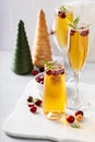 Christmas mimosas with apple cider and champagne or sparkling wine, festive Christmas cocktails