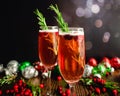 Christmas Mimosas Garnished with Sugared Cranberries and Rosemary Royalty Free Stock Photo