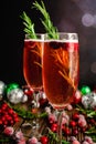 Christmas Mimosas Garnished with Sugared Cranberries and Rosemary Royalty Free Stock Photo