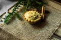 Christmas mince pie on burlap cloth with fir tree branches and cinnamon sticks, top angle view Royalty Free Stock Photo