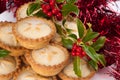 Christmas Mince Pies with Holly and Decorations Royalty Free Stock Photo