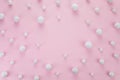 Christmas minimal concept. Snowballs on pink background. Composition with copy space
