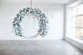 Christmas minimalism. White sitting ring with christmas decoration in modern white classical interior. Minimal christmas