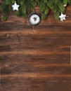 Christmas mockup with fir tree branches and white decorations on the wooden background Royalty Free Stock Photo