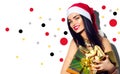 Christmas model girl. Santa holding gifts