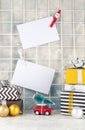 Christmas mood board with empty cards near gift boxes and toy ca Royalty Free Stock Photo