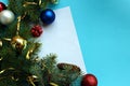 Christmas mood spruce branches and toys on a blue background Royalty Free Stock Photo