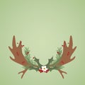 Christmas Moose Antlers and Flowers with Green Background Royalty Free Stock Photo