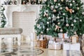 Christmas morning. classic luxury apartments with a white fireplace, decorated christmas tree. Holiday card. Royalty Free Stock Photo