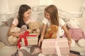 Christmas morning concept. Girls kids wake up on christmas morning. Lets open christmas gifts. Sisters best friends with