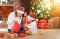 Christmas morning. family mother and daughter unpack, open gift Royalty Free Stock Photo