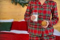 Christmas morning, girl in pajamas with cookies and a glass of milk. Selective focus Royalty Free Stock Photo