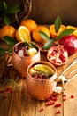 Christmas Moscow mule with pomegranate and orange