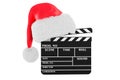 Christmas Movies concept. ÃÂ¡clapperboard with Christmas Santa hat. 3D rendering Royalty Free Stock Photo