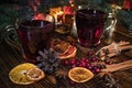 Christmas mulled red wine with and ingredients on a wooden brown table. Traditional hot drink at Christmas holiday Royalty Free Stock Photo