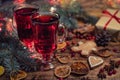 Christmas mulled red wine with and ingredients on a wooden brown table. Traditional hot drink at Christmas holiday Royalty Free Stock Photo