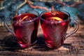 Christmas mulled red wine with and ingredients  on a wooden brown table. Traditional hot drink at Christmas holiday Royalty Free Stock Photo