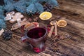 Christmas mulled red wine with and ingredients on a wooden brown table. Traditional hot drink at Christmas holiday Royalty Free Stock Photo