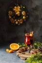 Christmas mulled red wine with spices, cranberry and fruits. Traditional Christmas hot drink. Christmas drink background Royalty Free Stock Photo