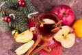 Christmas mulled wine with apples and citrus fruits and spices. View from above. Royalty Free Stock Photo