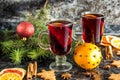 Christmas mulled wine with ginger biscuits orange cinnamon clove anise and fir tree on the dark table Royalty Free Stock Photo