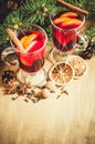 Christmas Mulled Wine, Spices and Xmas Tree Branches. Vintage Toned. Royalty Free Stock Photo