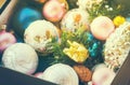 Christmas multicolored toys, textured balls lie in an open box, effect of the instagram Royalty Free Stock Photo