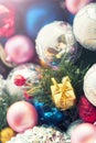 Christmas multicolored toys, textured balls lie in an open box, effect of the instagram Royalty Free Stock Photo