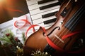 Christmas musical event with piano and violin close up Royalty Free Stock Photo