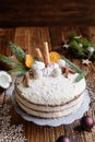 Christmas naked gingerbread cake with whipped cream and coconut filling