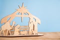 Christmas Nativity Scene of baby Jesus in the manger with Mary and Joseph in silhouette surrounded by the animals Royalty Free Stock Photo