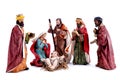 Christmas nativity scene with the Holy Family and the three wise men, isolated on white background Royalty Free Stock Photo