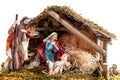 Christmas nativity scene with Holy Family in the hut, isolated on white background Royalty Free Stock Photo