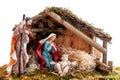 Christmas nativity scene with Holy Family in the hut, isolated on white background Royalty Free Stock Photo