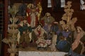 Christmas nativity scene - Jesus Christ, Mary and Joseph. Wooden figurines, donkey in the background